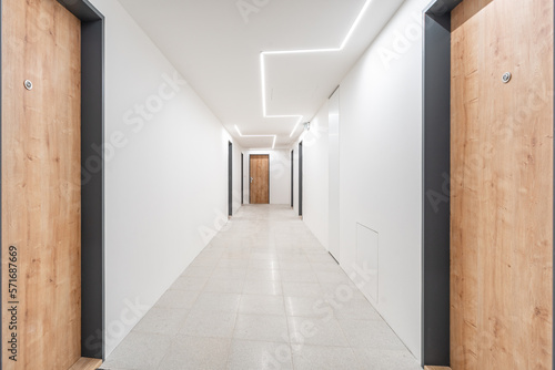 corridor with entrances to the apartment in the apartment building