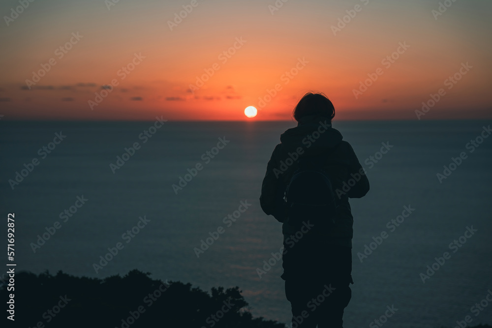 silhouette of a girl at sunset