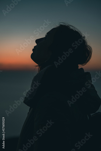 silhouette of a girl at sunset