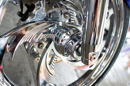 custom wheel with chrome spokes detail of custombike motorcycle or chopper bike photo