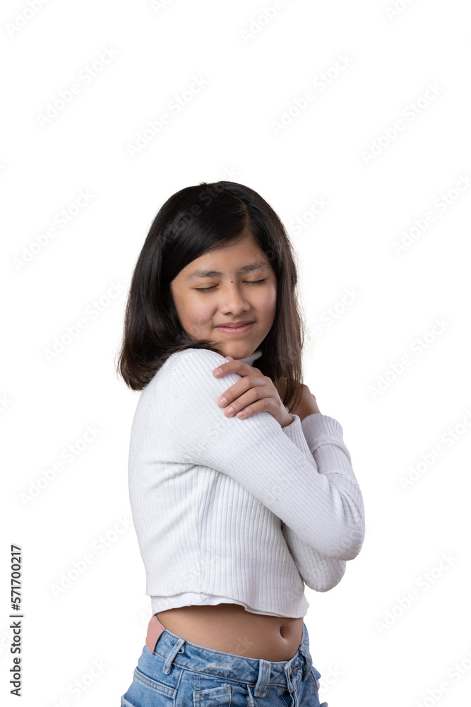 Mexican girl hugging herself, self love concept Mexican girl hugging herself, self love concept