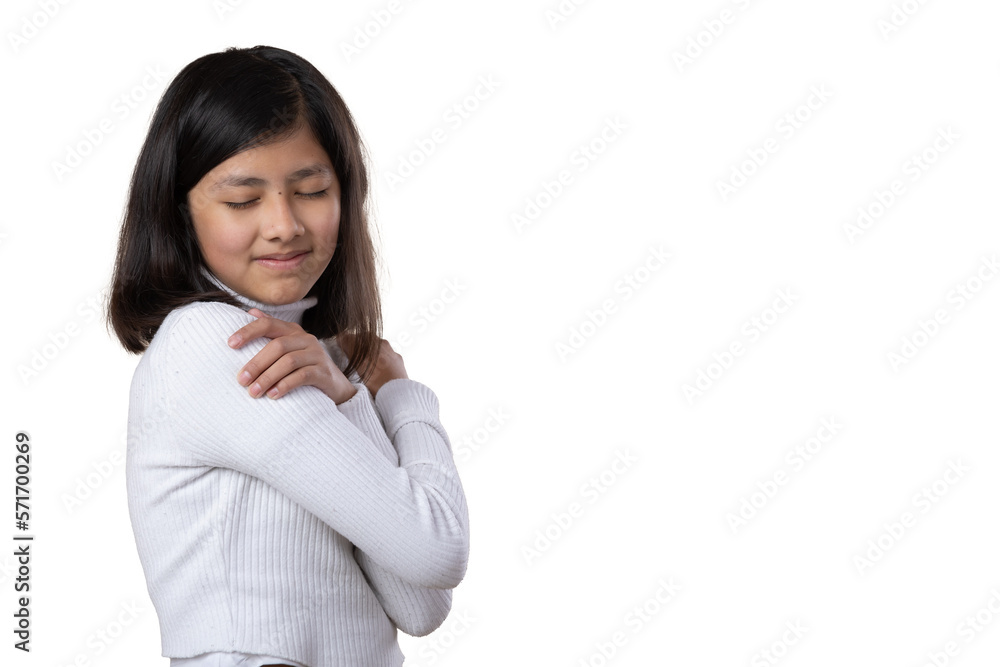 Mexican girl hugging herself, self love concept Mexican girl hugging herself, self love concept