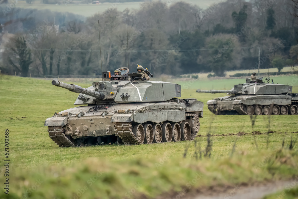 close-up of two British army FV4034 Challenger 2 ii main battle tanks in action on a military combat exercise, Wiltshire UK close-up of two British army FV4034 Challenger 2 ii main battle tanks in action on a military combat exercise, Wiltshire UK