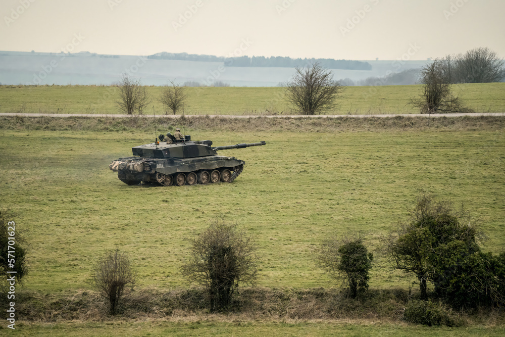 Fototapeta premium close-up of a British army FV4034 Challenger 2 ii main battle tank in action on a military combat exercise, Wiltshire UK