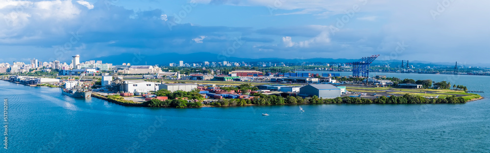 A panorama view from the port towards the commercial dock amd airport of San Juan, Puerto Rico on a bright sunny day