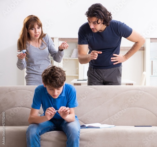 Concept of underage smoking with young boy and family