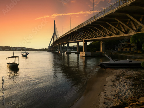 Sunset with the cable-stayed bridge Jorge Amado in the background in Ilheus, Bahia, Brazil photo