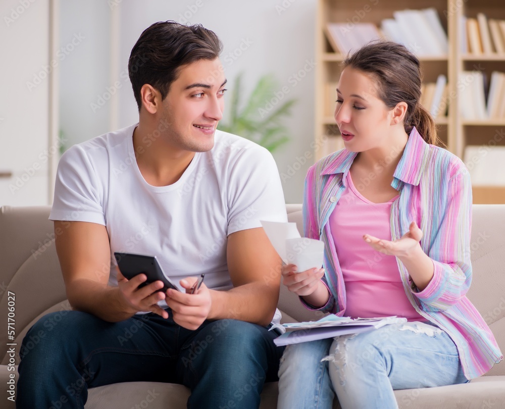 Young family discussing family finances Young family discussing family finances