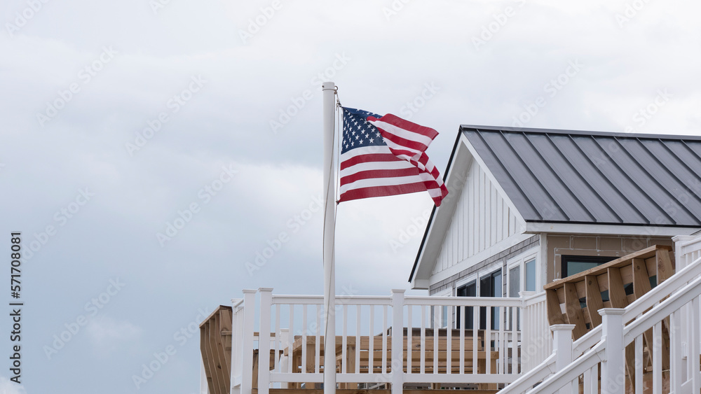 Fototapeta premium American flag on beach, horizon
