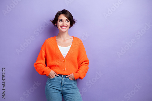 Portrait of lovely positive lady toothy smile look interested empty space isolated on purple color background