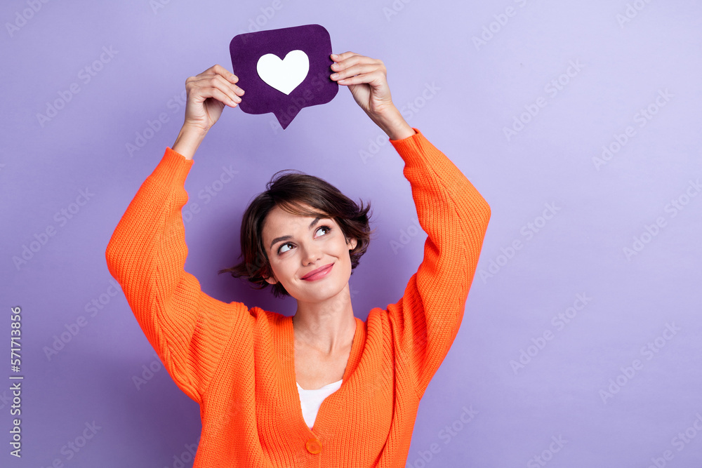 Photo of lovely pretty lady wear stylish clothes arm hold social media like under head look empty space isolated on purple color background - obrazy, fototapety, plakaty 