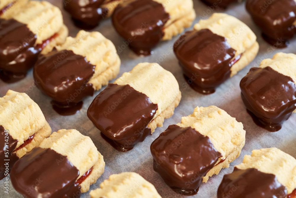 Christmas cookie filled with jam and dipped in chocolate Christmas cookie filled with jam and dipped in chocolate