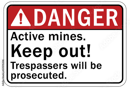 Active mine site warning sign and labels active mines  keep out. Trespasser will be prosecuted