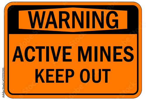 Active mine site warning sign and labels keep out