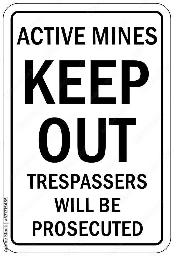 Active mine site warning sign and labels keep out. Trespasser will be prosecuted Active mine site warning sign and labels keep out. Trespasser will be prosecuted