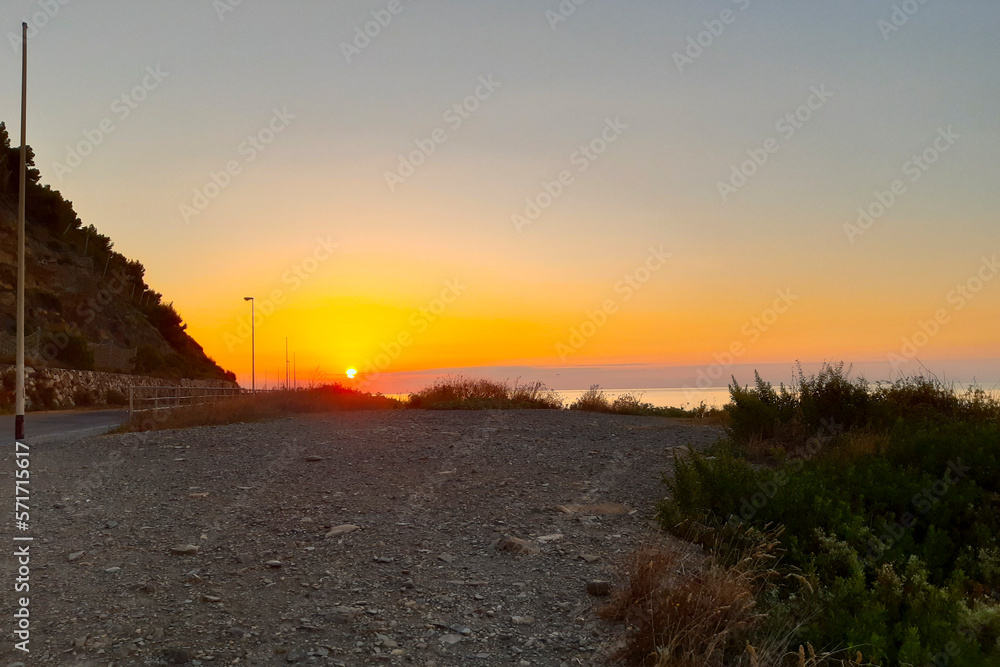 Panorama del mare all'alba sul tratto di strada incompiuta che va da Diano Marina ad Imperia, viaggi e paesaggi in Liguria Panorama del mare all'alba sul tratto di strada incompiuta che va da Diano Marina ad Imperia, viaggi e paesaggi in Liguria