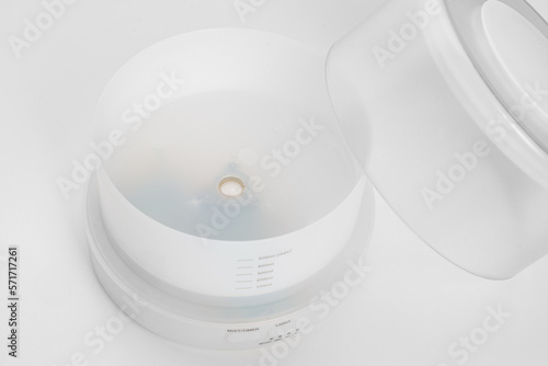 white small humidifier on a white background. 