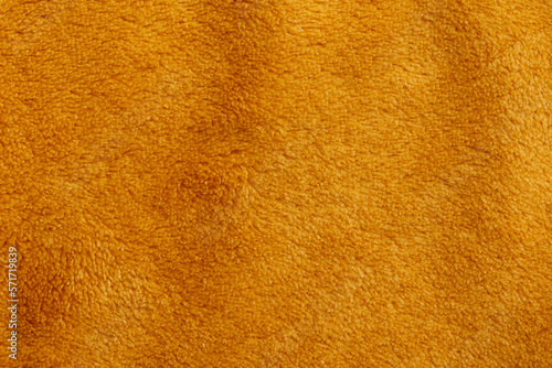 background in orange colored structure of a fabric