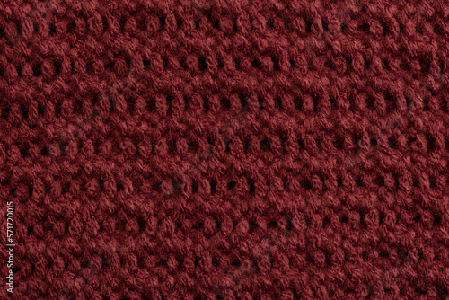 background in aubergine colored structure of a fabric