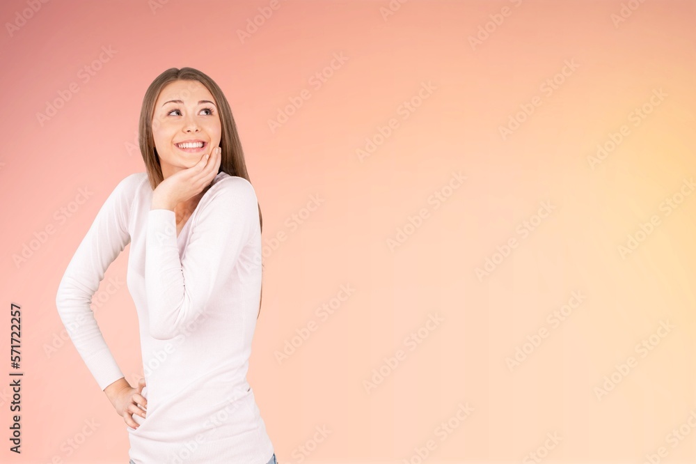 Happy young smart woman posing on background Happy young smart woman posing on background