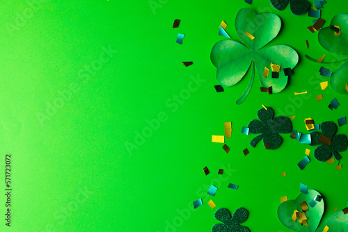 Image of green clover and copy space on green background