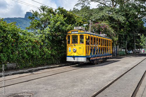 The famous old tram Bonde de Santa Teresa in Rio de Janeiro, Brazil. Yellow tram traveling through Rio de Janeiro