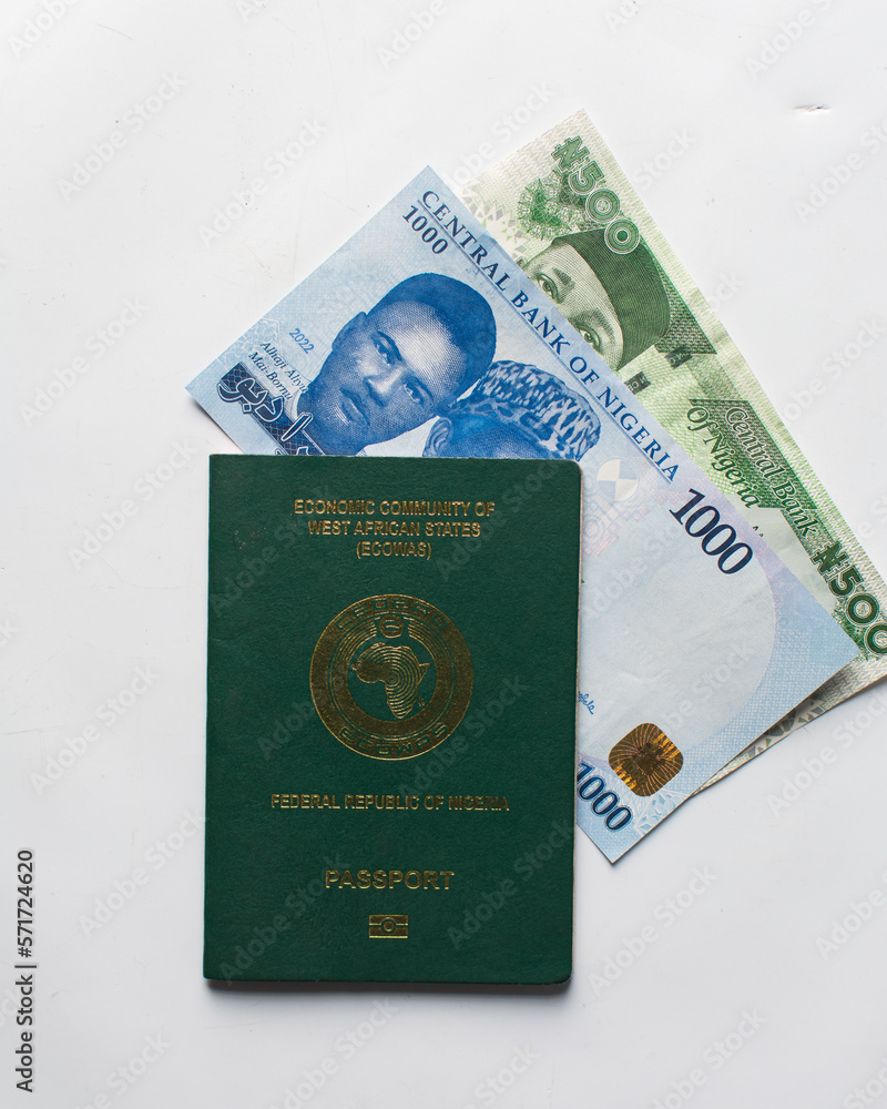 The new Nigerian 1000 and 500 Naira notes in a nigerian passport, Nigeria's new currency in a passport The new Nigerian 1000 and 500 Naira notes in a nigerian passport, Nigeria's new currency in a passport