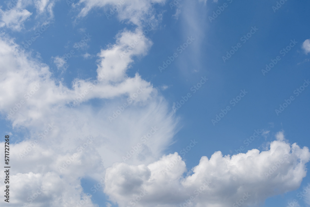 Cloudscape - Blue sky and white clouds, wide panorama.