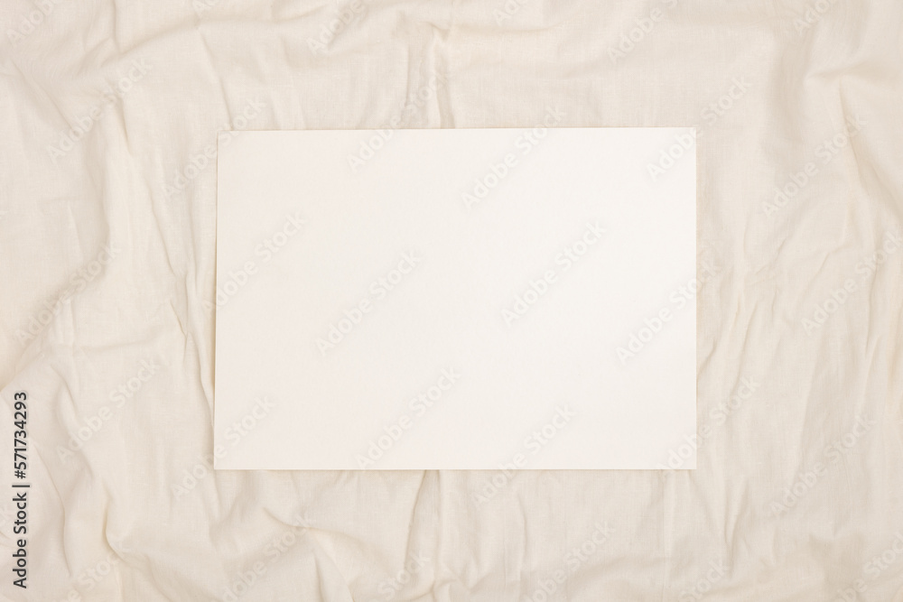 Blank note paper on a fabric background. Blank note paper on a fabric background.