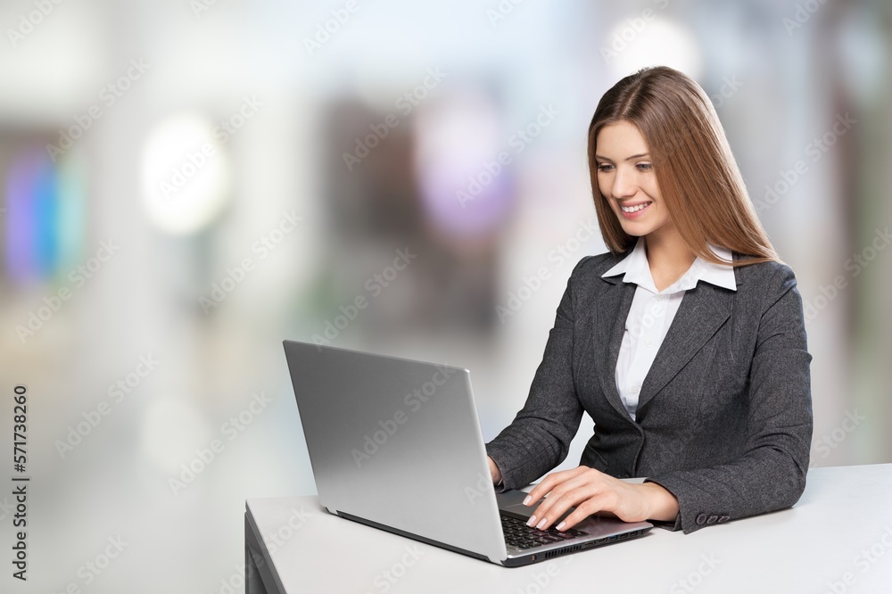 Young student woman working with computer
