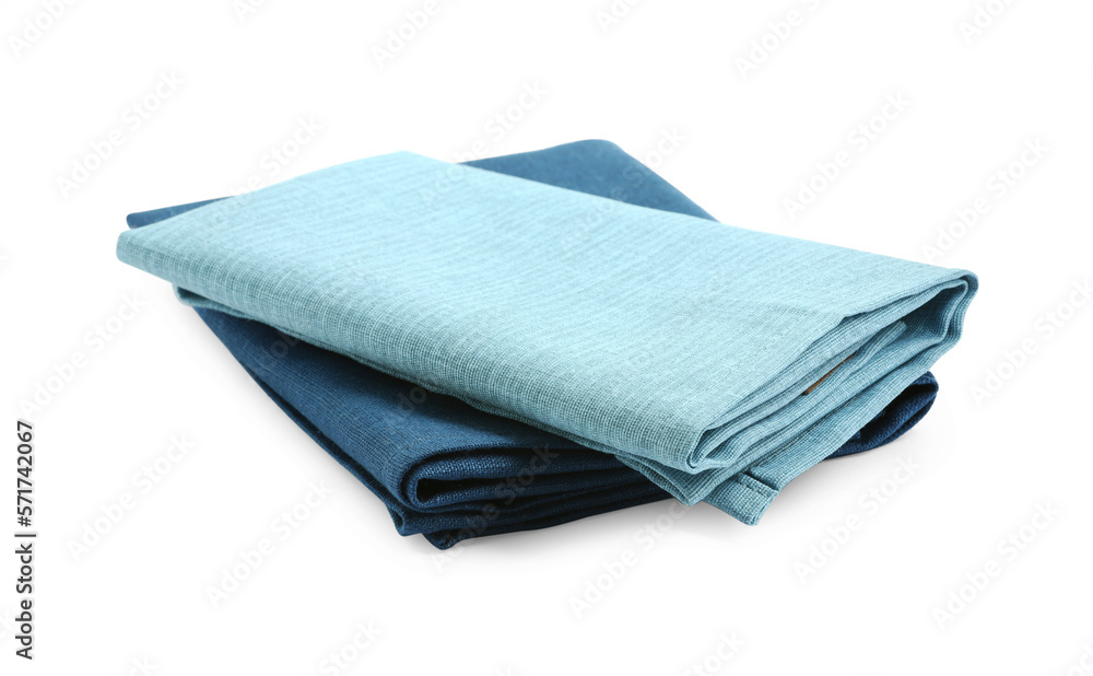 Folded fabric napkins for table setting isolated on white Folded fabric napkins for table setting isolated on white