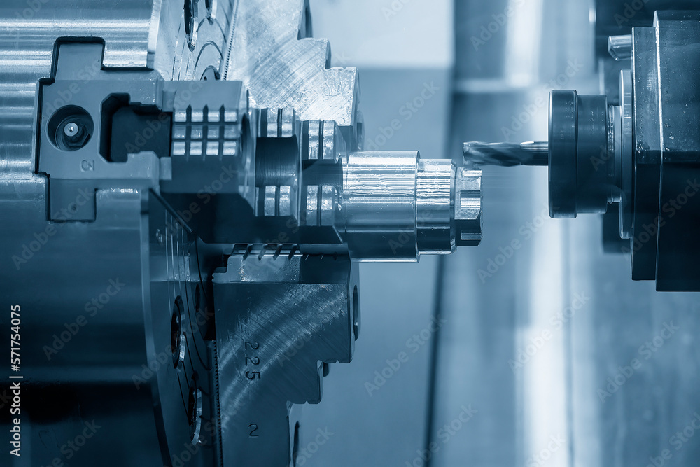 The multi-tasking CNC lathe machine milling cut the metal shaft parts by milling turret. The multi-tasking CNC lathe machine milling cut the metal shaft parts by milling turret.