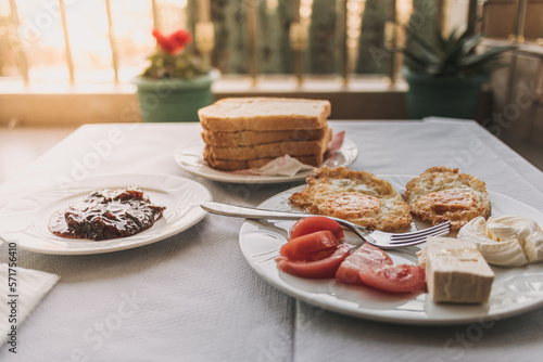 Simple European breakfast served in the guesthouse for travellers. photo