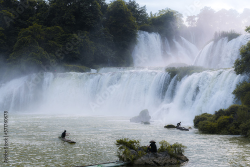 Ban Gioc Detian Falls with unique natural beauty on the border between China and Vietnam, fishermen catching fish at the sunset