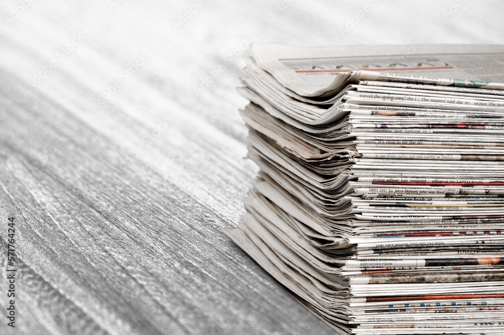 A pile of dusty, old magazines on background A pile of dusty, old magazines on background