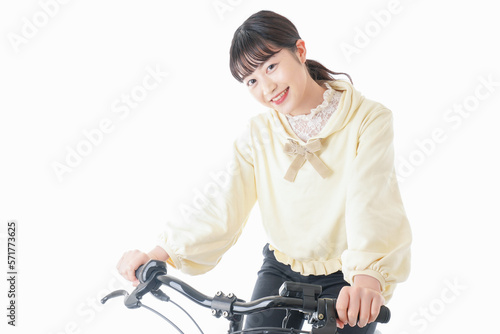 自転車に乗る若い女性 photo