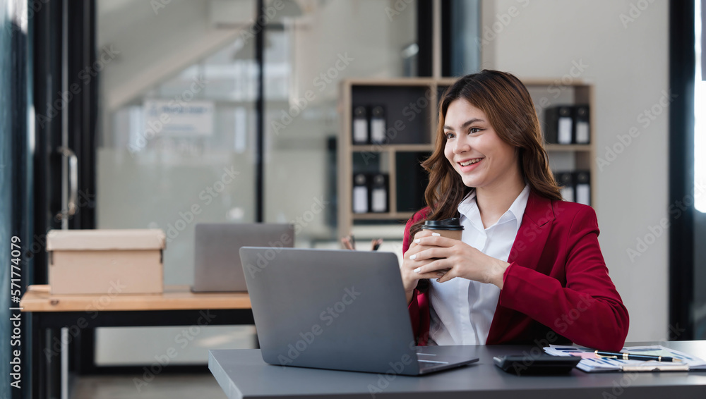 Business woman using calculator for do math finance on wooden desk in office and business working background, tax, accounting, statistics and analytic research concept. Business woman using calculator for do math finance on wooden desk in office and business working background, tax, accounting, statistics and analytic research concept.