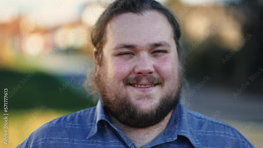 Closeup face of a positive casual male caucasian person with joyful expression Closeup face of a positive casual male caucasian person with joyful expression