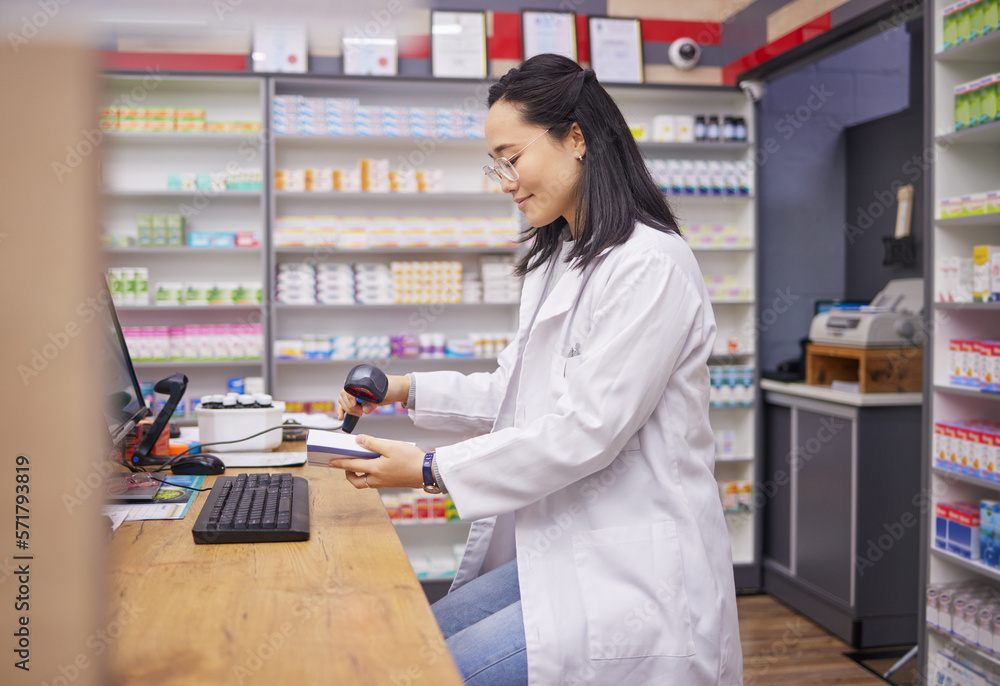 Pharmacy, help and asian woman at checkout counter for prescription drugs  scanning medicine. Healthcare, pills and pharmacist from Japan with medical  product in box and digital scanner in drugstore. Stock Photo