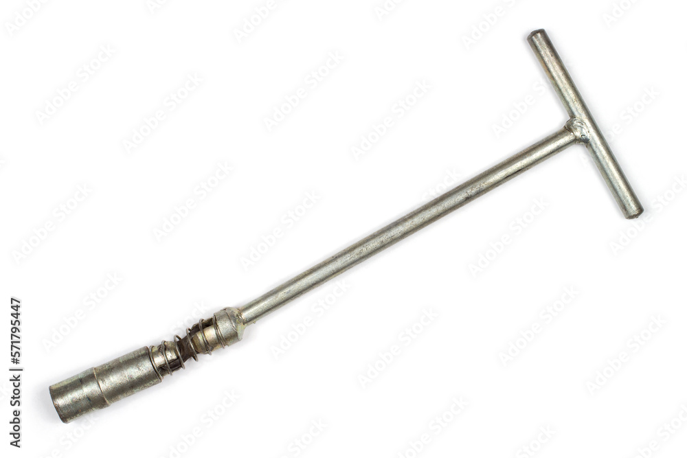 Wrench for unscrewing car spark plugs. Wrench on a white background. Wrench for unscrewing car spark plugs. Wrench on a white background.