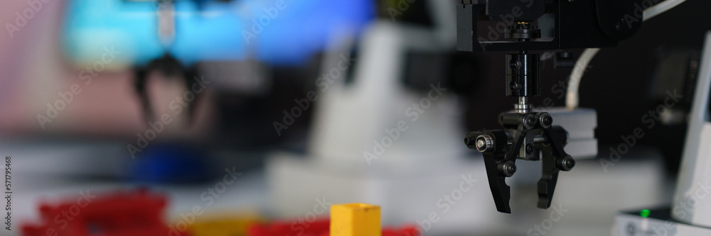 Mechanical robotic hand manipulator in industrial production Mechanical robotic hand manipulator in industrial production