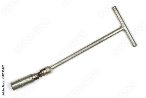 Wrench for unscrewing car spark plugs. Wrench on a white background. © Сергей Васильченко