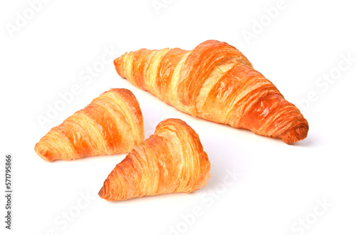 The butter croissant on the white background.