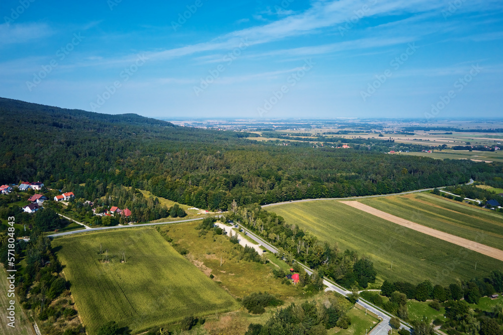 Mountain village, aerial view. Beautiful mountain landscape with residential neighborhood and green fields. Countryside view Mountain village, aerial view. Beautiful mountain landscape with residential neighborhood and green fields. Countryside view