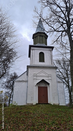 Lutheran Church of Dzirciems against the backdrop of gloomy sky in Latvian village of Dzirciems in autumn 2022