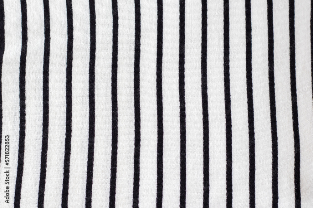 Striped white and black natural cotton fabric. Vertical stripes.