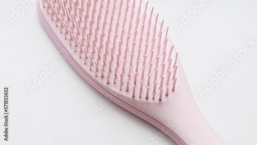 A dirty comb is placed on the table