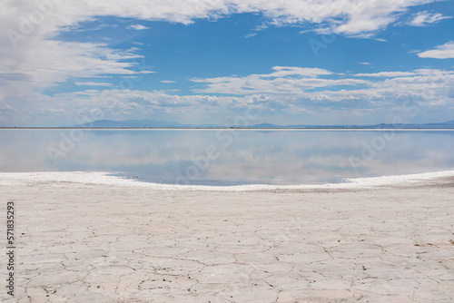 Panoramic view of beautiful mountains reflecting in lake of Bonneville Salt Flats  Wendover  Western Utah  USA  America. Looking at summits of Silver Island Mountain range. West of Great Salt Lake