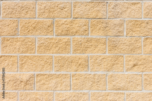 wall texture with yellow sand bricks