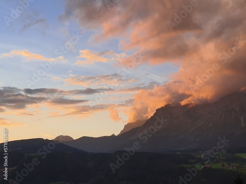 Beautiful colorful sunset over the mountains in Schladming with view to distinctive famous Dachstein mountain in Styria, Austria